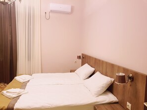 Deluxe-Dreibettzimmer | Allergikerbettwaren, individuell dekoriert, individuell eingerichtet