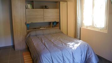 Premium bedding, blackout drapes, iron/ironing board, free WiFi