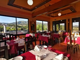 Breakfast, lunch, dinner served; Portuguese cuisine, ocean views 