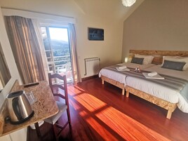 Panoramic Double Room, Mountain View | Individually decorated, desk, laptop workspace, soundproofing