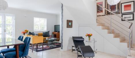 Luxury Apartment | Living area | 43-inch LCD TV with satellite channels, TV, fireplace