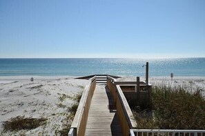 A wooden boardwalk leading to a sandy beach with a clear view of the ocean. - Pet friendly, Water, Water Everywhere SPC4210 (Destin)