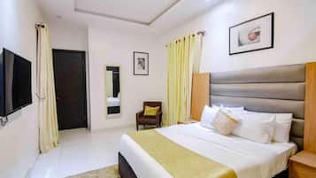 Apartment, 1 Bedroom | In-room safe, desk, soundproofing, iron/ironing board