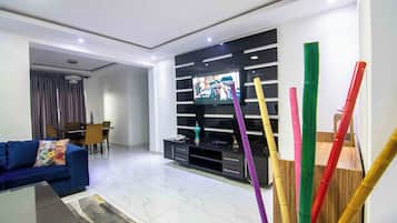 40-inch flat-screen TV with satellite channels, TV