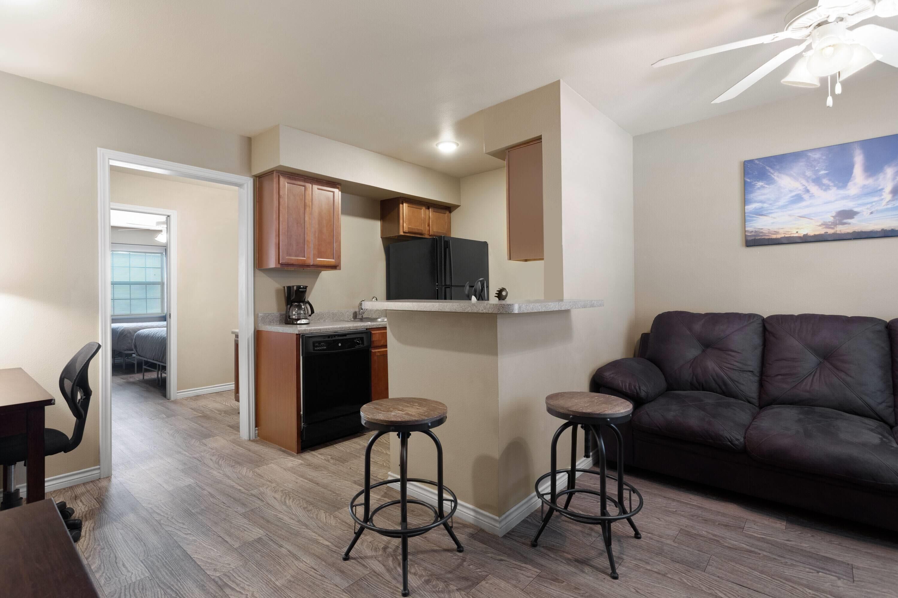 Suite, 1 Bedroom, Non Smoking | Desk, laptop workspace, blackout drapes, soundproofing