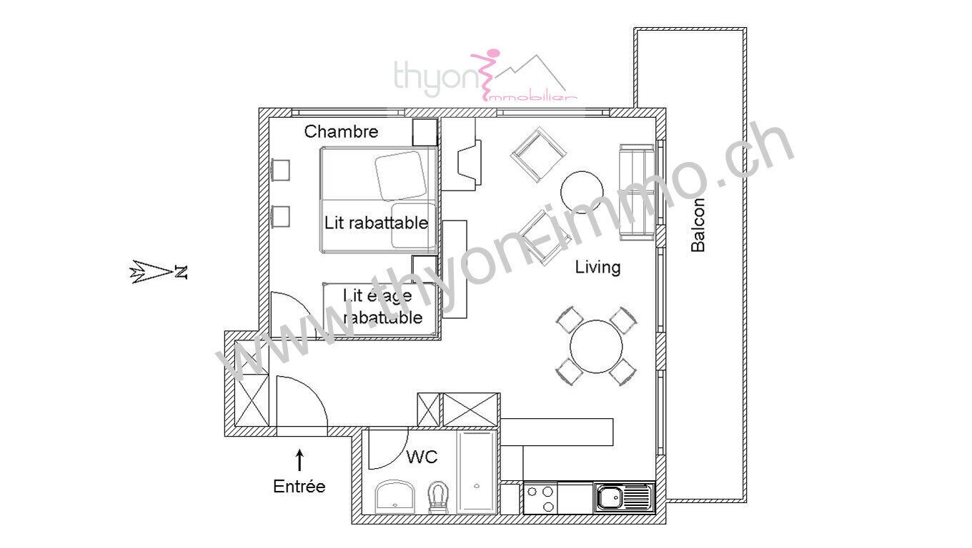 A floor plan of a hotel room with a balcony, a living area, a kitchen, a bathroom, and a bedroom.
