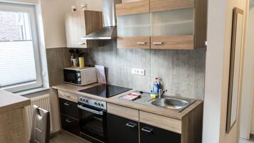 Apartment | Private kitchen | Fridge, microwave, oven, stovetop