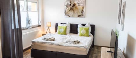 Appartement | 1 chambre, chambres insonorisées, fer et planche à repasser