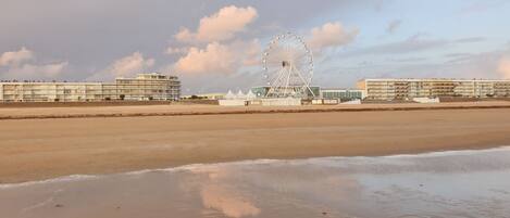 On the beach, sun-loungers, beach towels