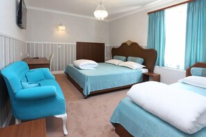 Deluxe Triple Room, Multiple Beds | Memory foam beds, minibar, individually decorated