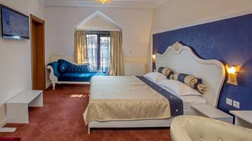 Departamento Deluxe, 1 habitación | Camas con efecto memoria, minibar y decoración personalizada