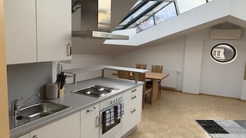Loft, 1 Bedroom | Private kitchen | Full-sized fridge, oven, stovetop, electric kettle