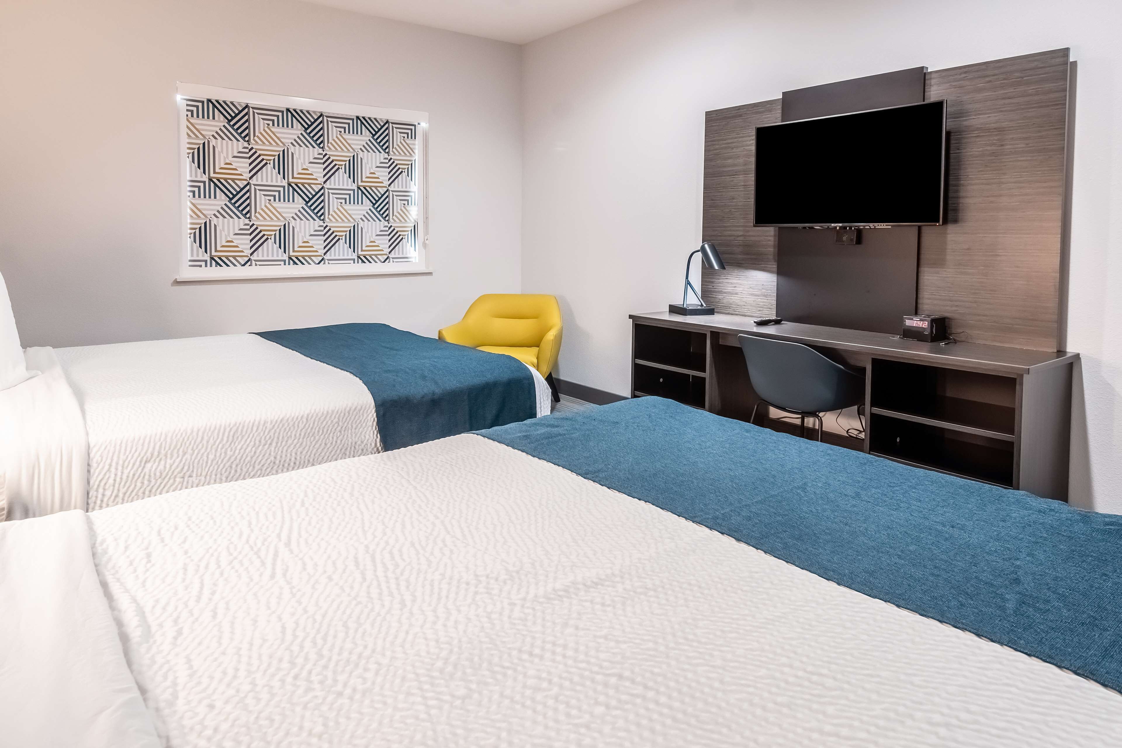 desk, laptop workspace, blackout curtains, iron/ironing board