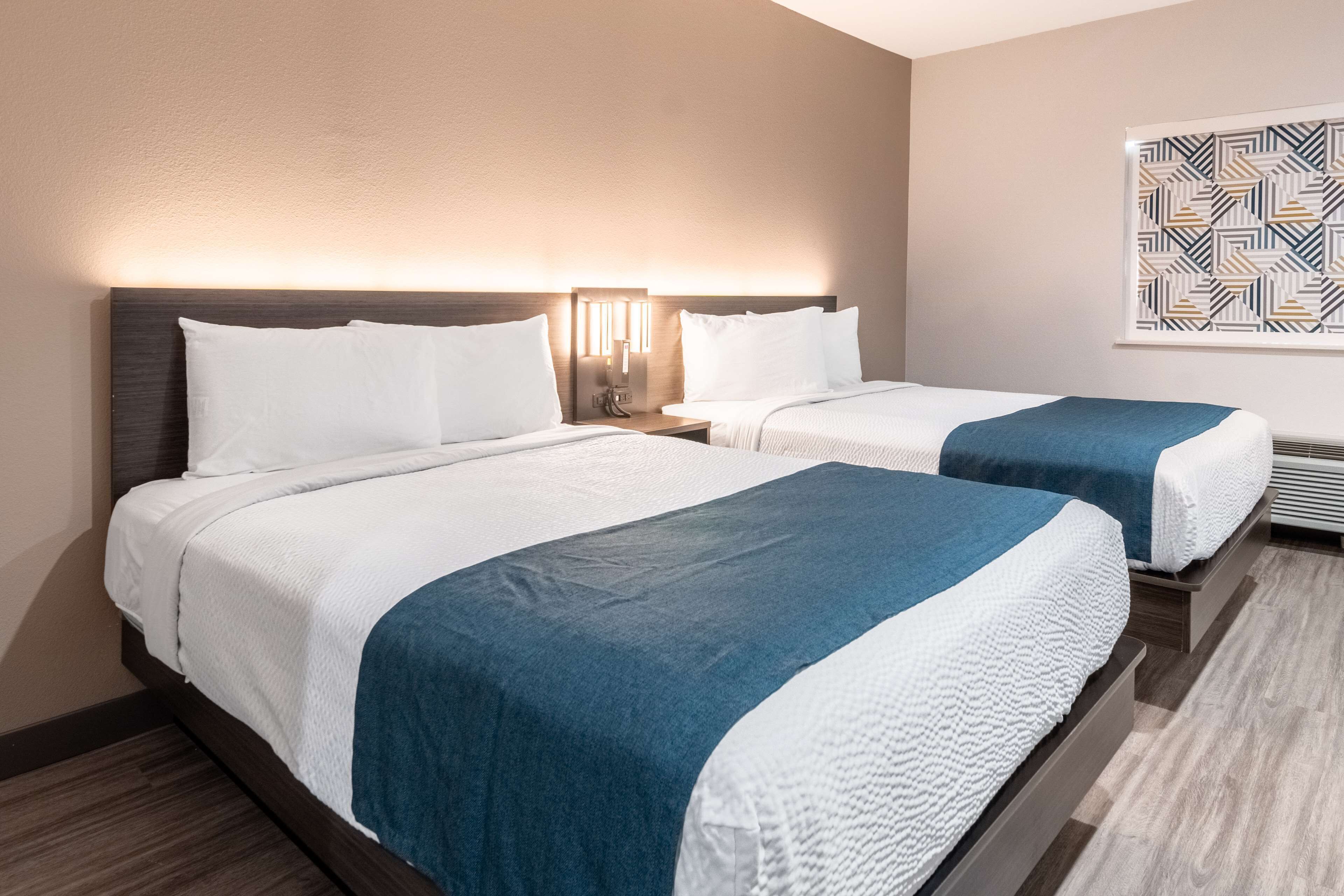 Desk, laptop workspace, blackout curtains, iron/ironing board