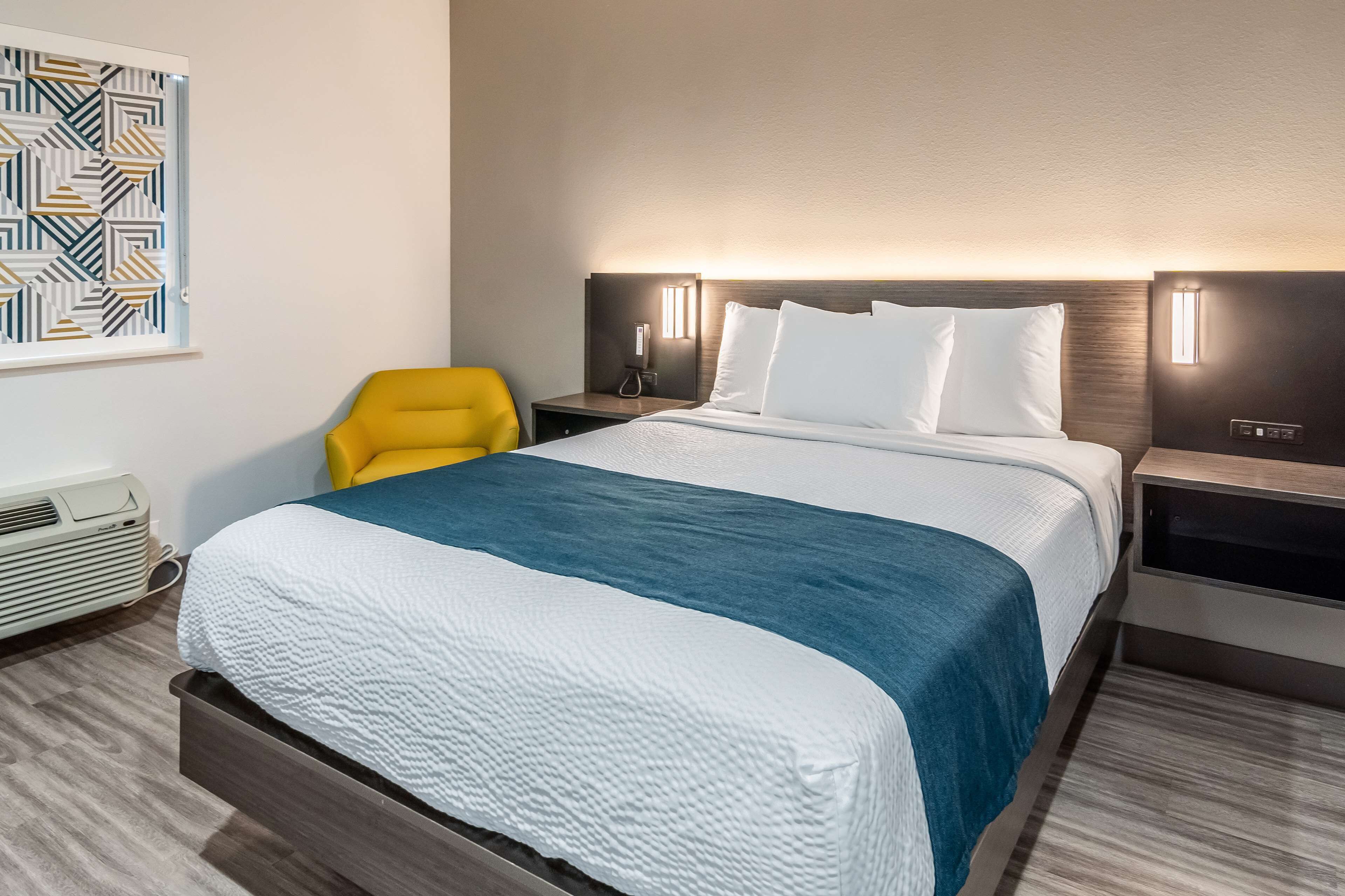 Desk, laptop workspace, blackout curtains, iron/ironing board