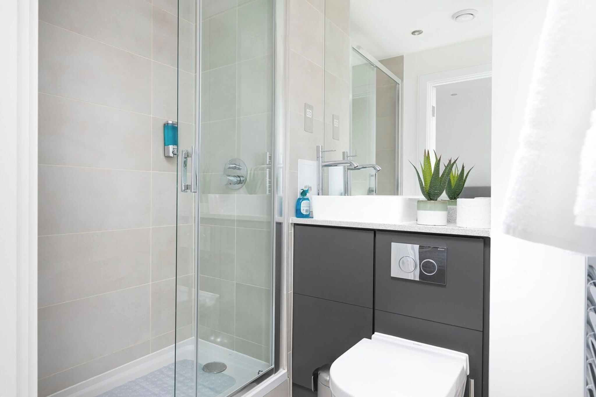 Bathtub, hair dryer, towels