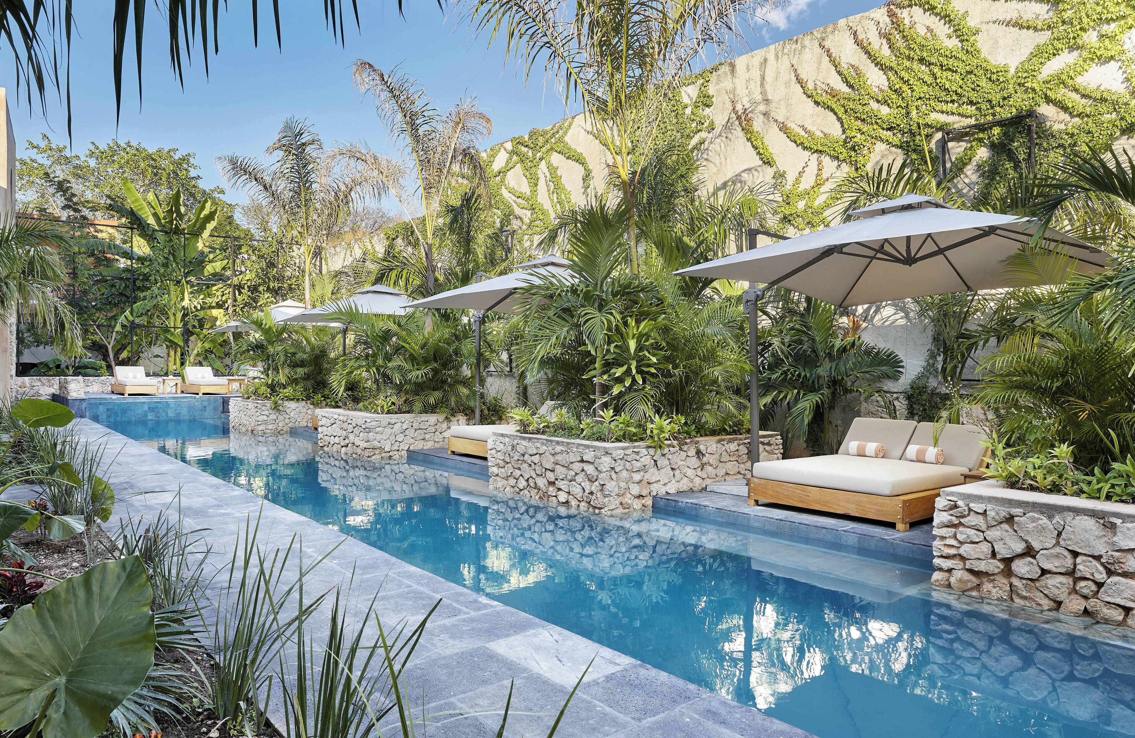 Outdoor pool, open 8:00 AM to 6:00 PM, pool umbrellas, sun loungers