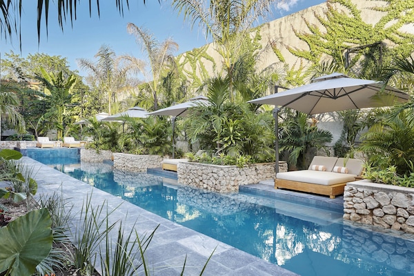 Outdoor pool, open 8:00 AM to 6:00 PM, pool umbrellas, pool loungers