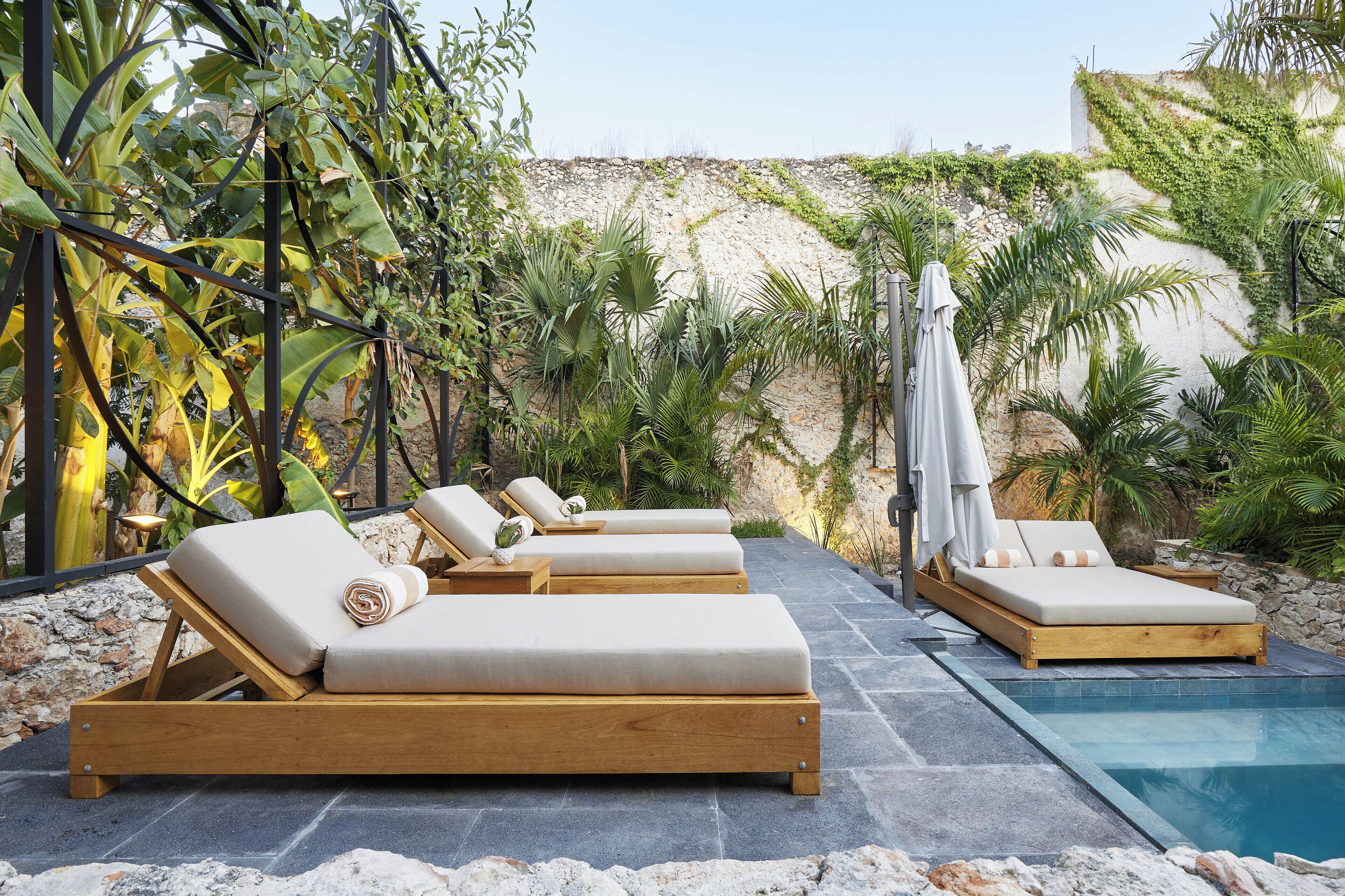 Outdoor pool, open 8:00 AM to 6:00 PM, pool umbrellas, sun loungers