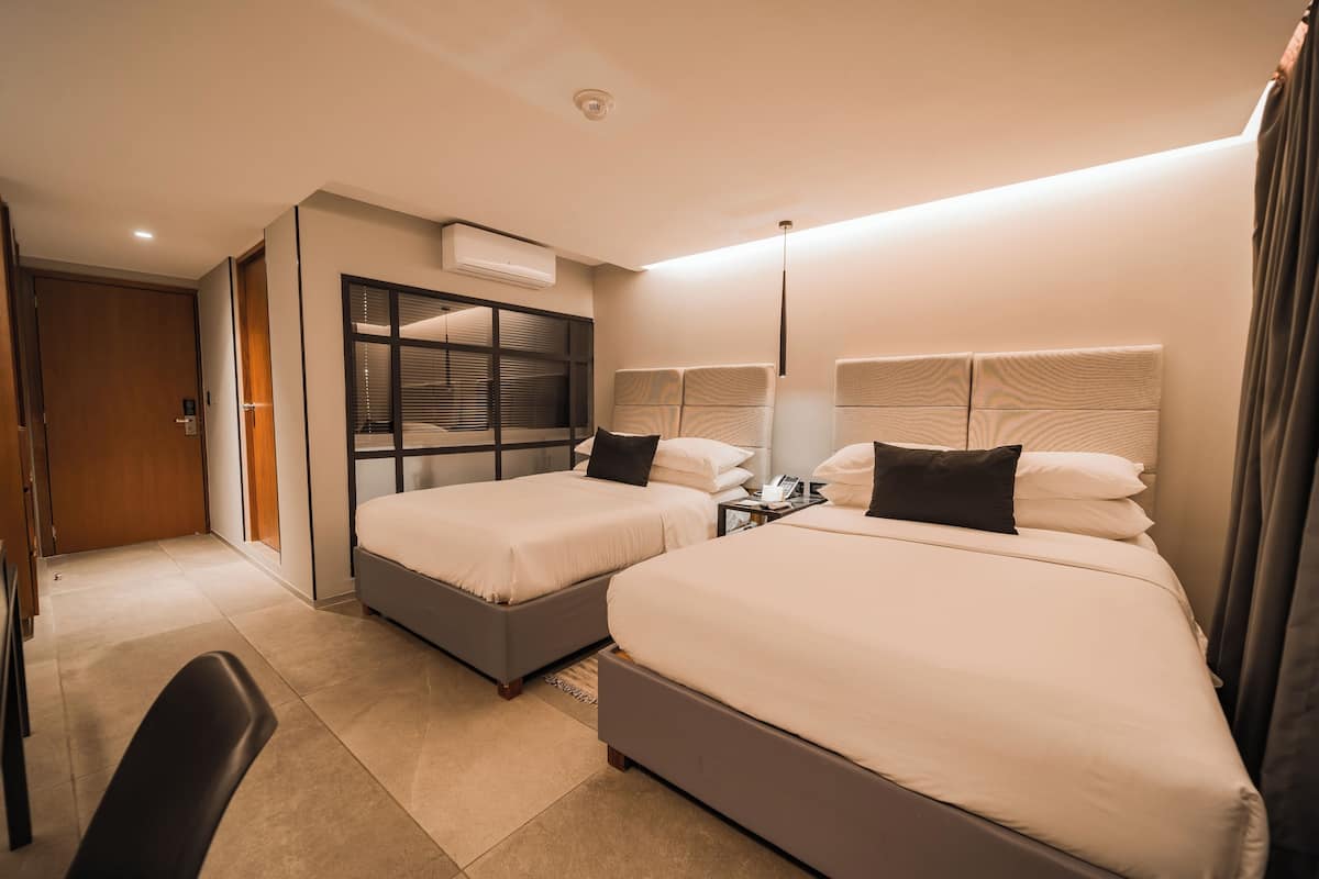 Doppia Standard | Copriletto in piuma, materassi Tempur-Pedic, con arredamento individuale