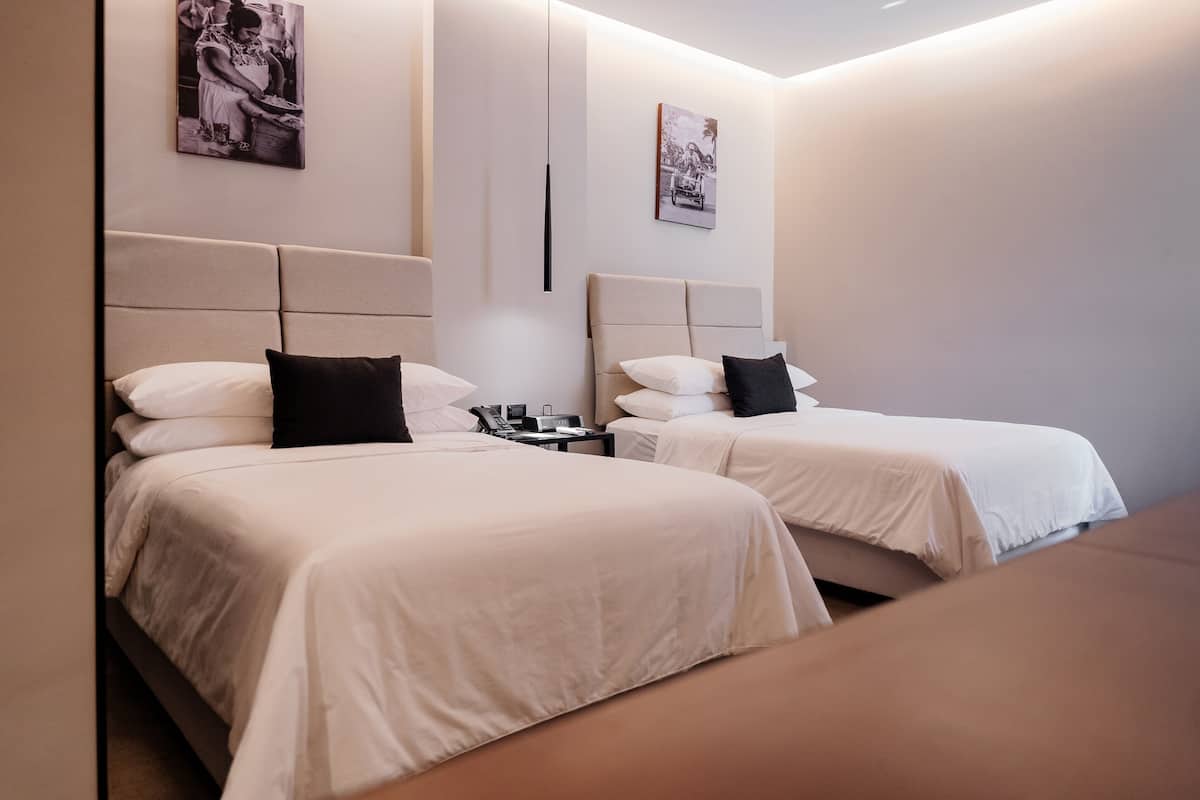 Doppia Superior | Copriletto in piuma, materassi Tempur-Pedic, con arredamento individuale