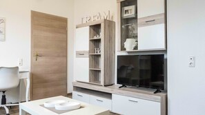 Apartment | Wohnbereich | Flachbildfernseher