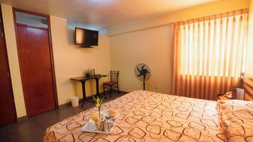 Standard Single Room, 1 King Bed | Individually furnished, iron/ironing board, bed sheets