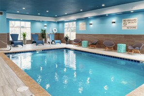 A swimming pool with lounge chairs and a no lifeguard on duty sign. - Hampton Inn & Suites Pittsburgh New Stanton (New Stanton)