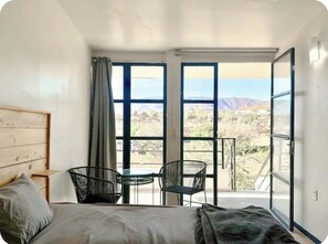 Loft, 1 King Bed & 1 Queen Bed | Premium bedding, down comforters, individually decorated