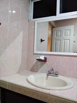 Shower, designer toiletries, towels, soap