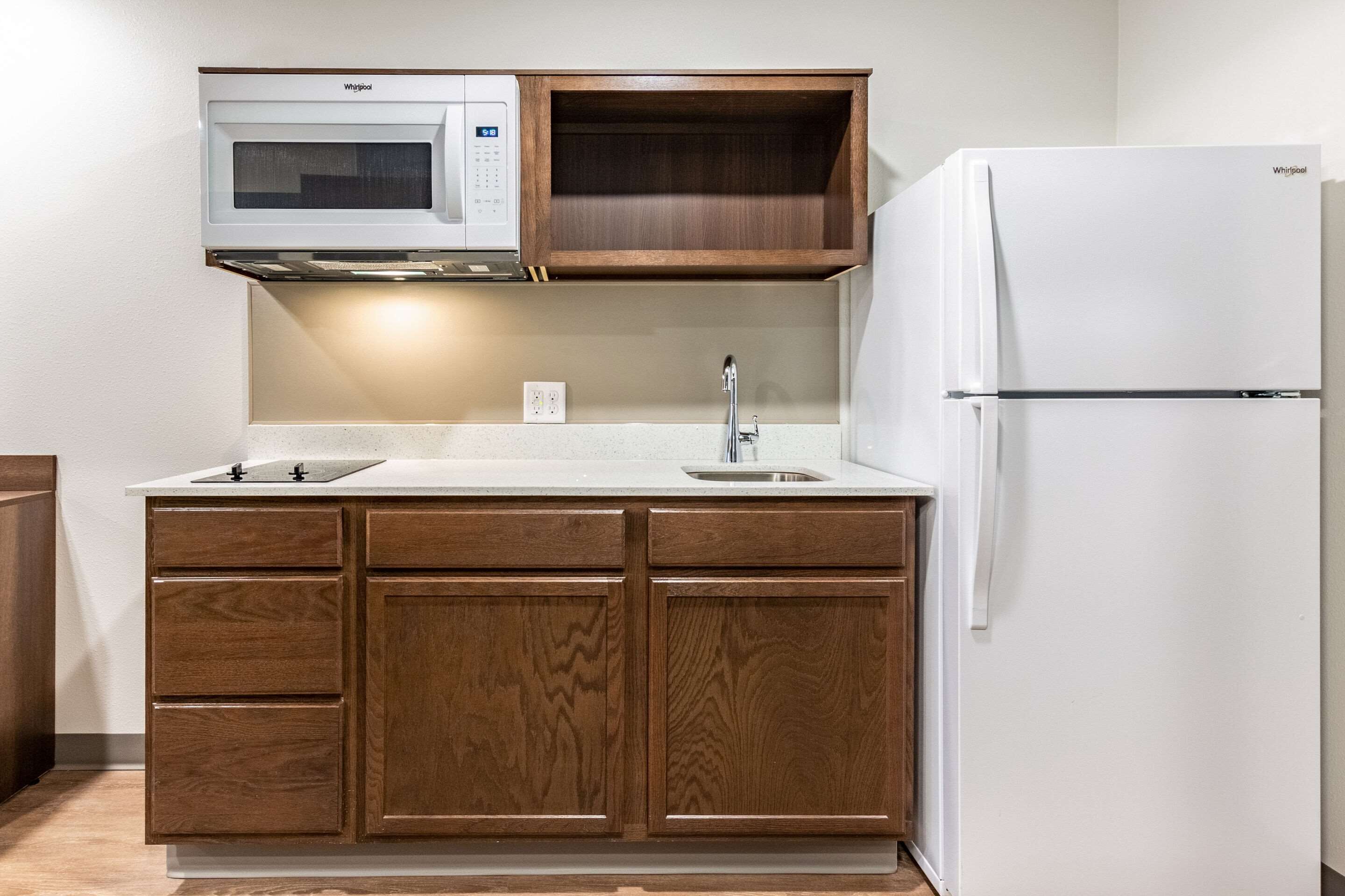 full-sized fridge, microwave, stovetop