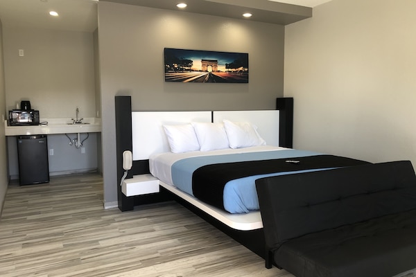 Desk, laptop workspace, blackout drapes, soundproofing