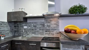 Apartamento, 1 quarto | Cozinha privada | Geladeira, cooktop, cafeteira/chaleira, chaleira elétrica