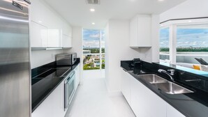 Condo, 4 chambres | Cuisine privée