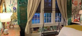 Curated boutique stay in a 1920s English bungalow. Modern twist on a classic!