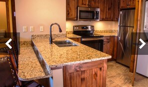 Microwave, dishwasher, coffee/tea maker, cookware/dishes/utensils