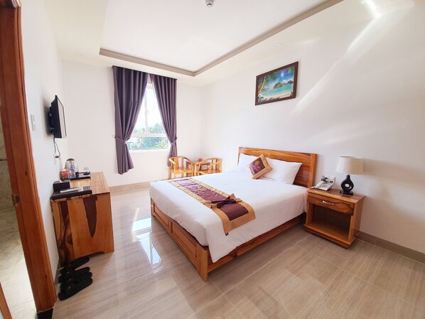 Basic dubbelrum | Minibar, skrivbord, mörkläggningsgardiner och ljudisolering