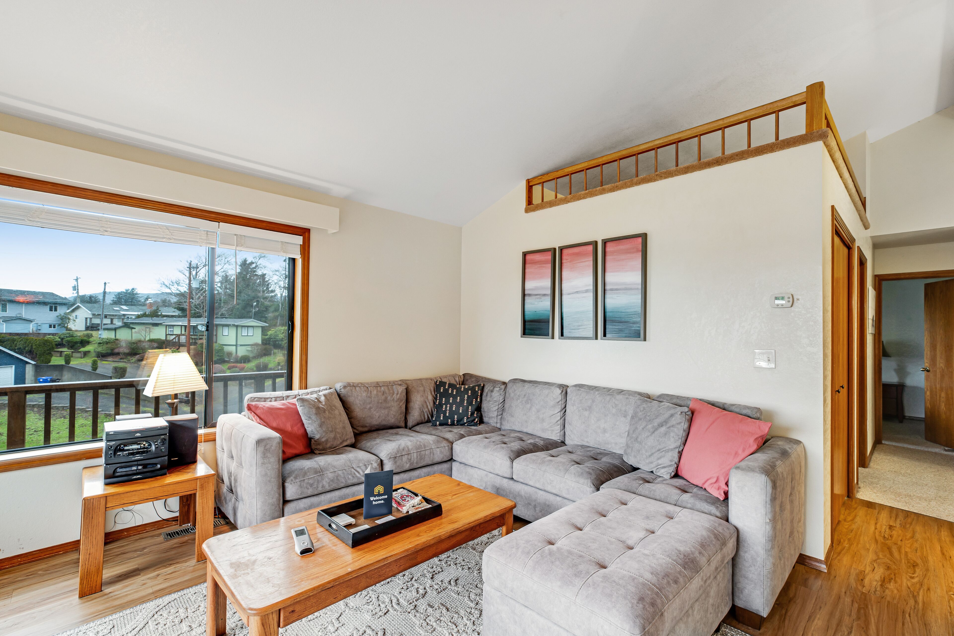 Ocean-view home overlooking Netarts Bay with deck & hot tub