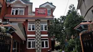 A building with a sign for "Great Nepal Bed & Breakfast Restaurant & bar." - Great Nepal Bed & Breakfast (Lalitpur)