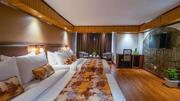 Premium bedding, desk, laptop workspace, blackout drapes