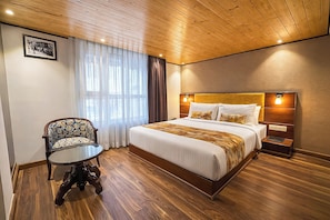 Deluxe Double Room | Premium bedding, desk, laptop workspace, blackout drapes