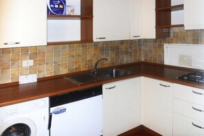 Fridge, stovetop, electric kettle, toaster