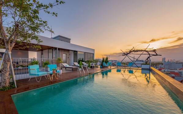 Outdoor pool, open 6:30 AM to 8:30 PM, pool umbrellas, sun loungers - Prana Boutique Hotel and Apartments (Da Nang)