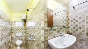 A bathroom with a toilet, bidet, and sink, marble walls, and a window. - Treebo Trip Flama House (Baruipur)