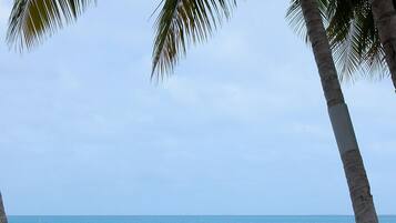 Private beach, white sand, sun-loungers, beach umbrellas