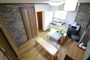 Economy Quadruple Room | Living room