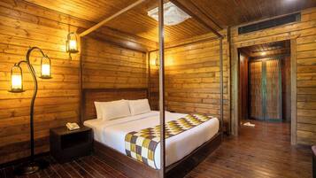Habitación de lujo | Caja fuerte y ropa de cama