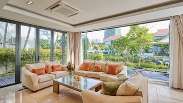 3 Bedroom Standard Villa, Garden View | Living area | 40-inch flat-screen TV with digital channels
