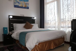 Desk, iron/ironing board, free WiFi, bed sheets - Fantasy Village Hotel (Dodoma)