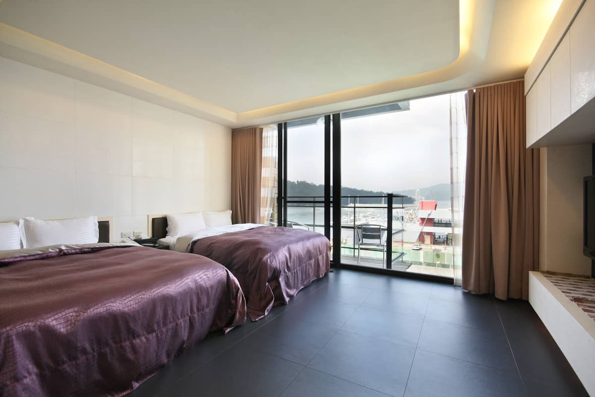 Quadruple Room, Lake View | Blackout drapes, WiFi (free), bed sheets